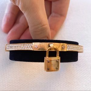 MK gold bangle, 7”